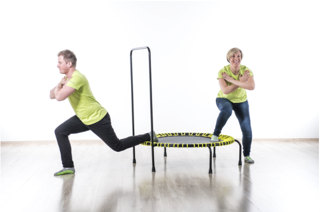 Adults squatting on Akrobat Speed Bouncer